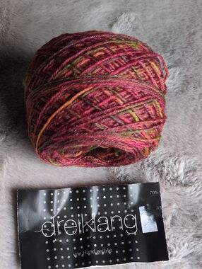 Wool silk blend fingering weight yarn in rusts and greens - 61 grams